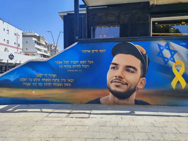 One Man’s Mission to Keep the Hostages in Our Hearts Through Street Art