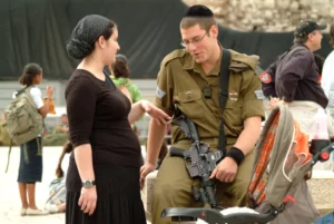 Beyond the Conventional: Haredi Soldiers and Wives of Warriors Stand with the IDF