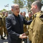 נתניהו למתגייסים החדשים: "ערוכים הן להגנה והן להתקפה"