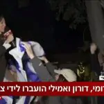 שמחה בשידור: הכתבת עלתה על כתפיו של חבר של החטופה