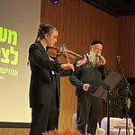 "ואפילו בהסתרה": הביצוע המשותף של שורדת השבי אגם ברגר והזמר שולי רנד