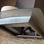 השוטרים נדהמו: אקדח 9 מ"מ אותר בתוך קולט אדים בדירה ביפו